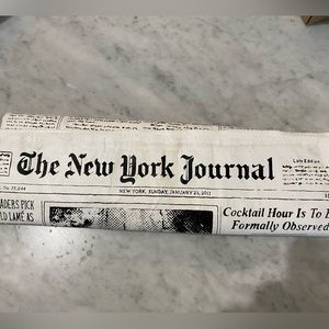 100% authentic-super rare Kate Spade New York newspaper clutch